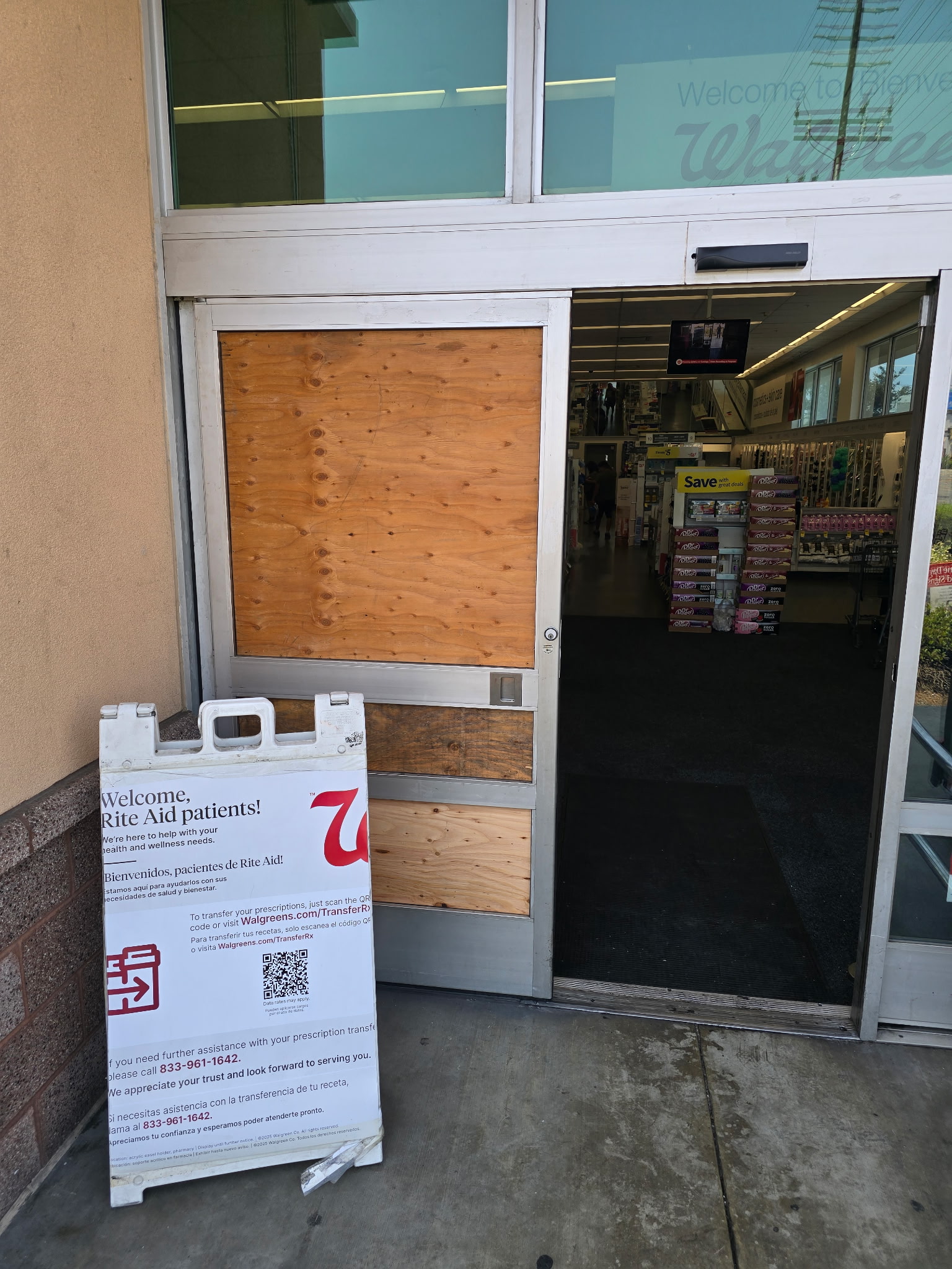 Smashed storefront door before