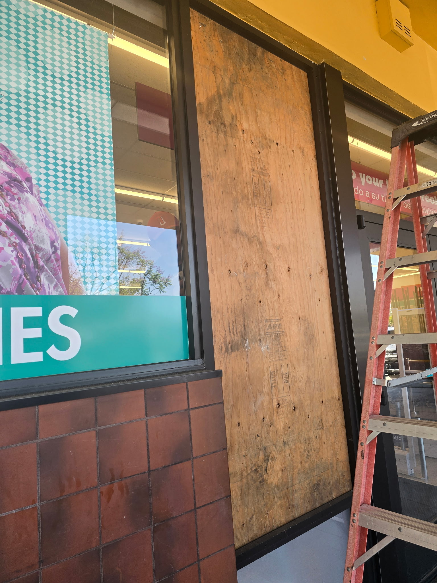 Storefront door glass repair before
