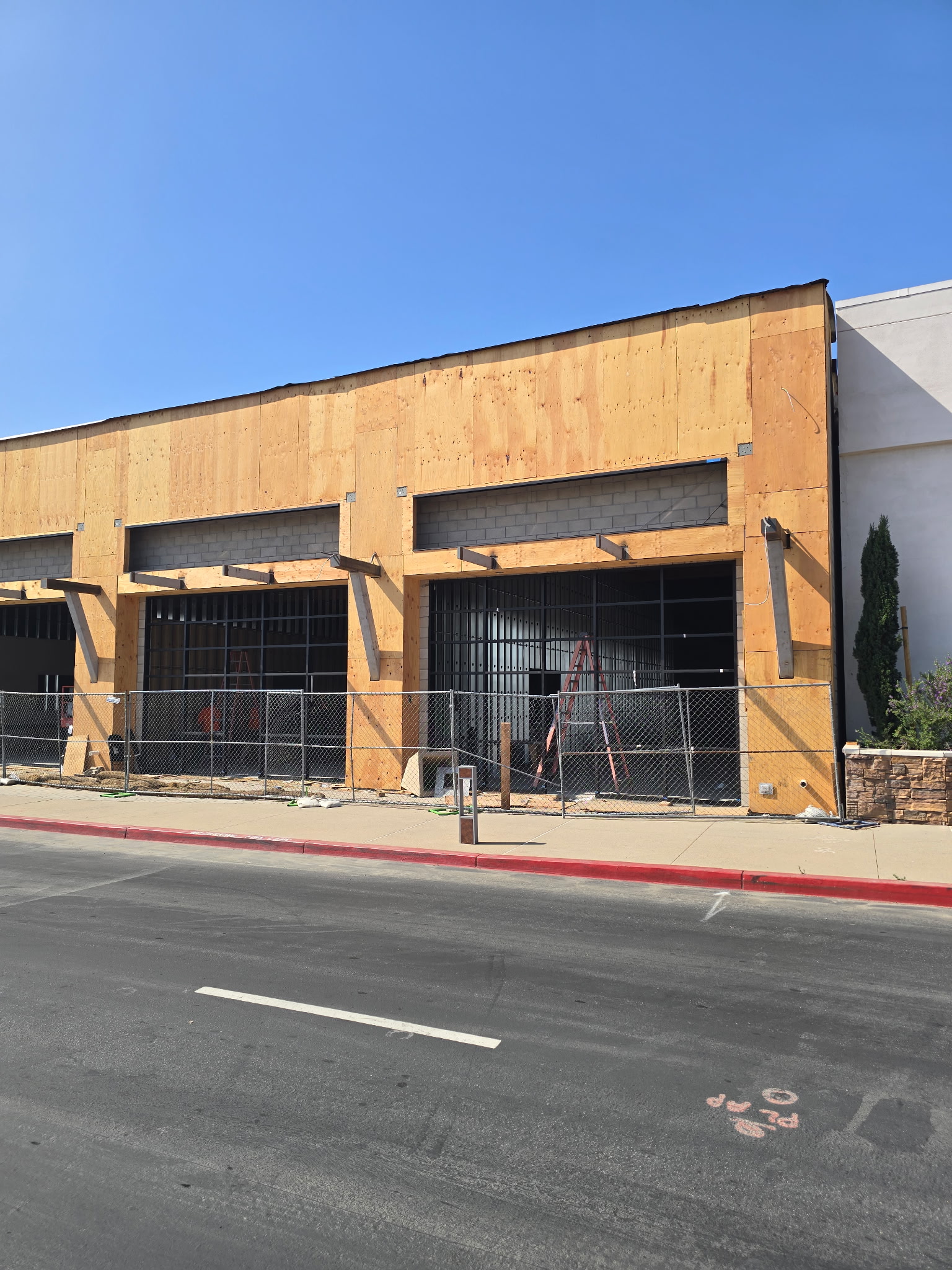 Commercial glass installation in progress