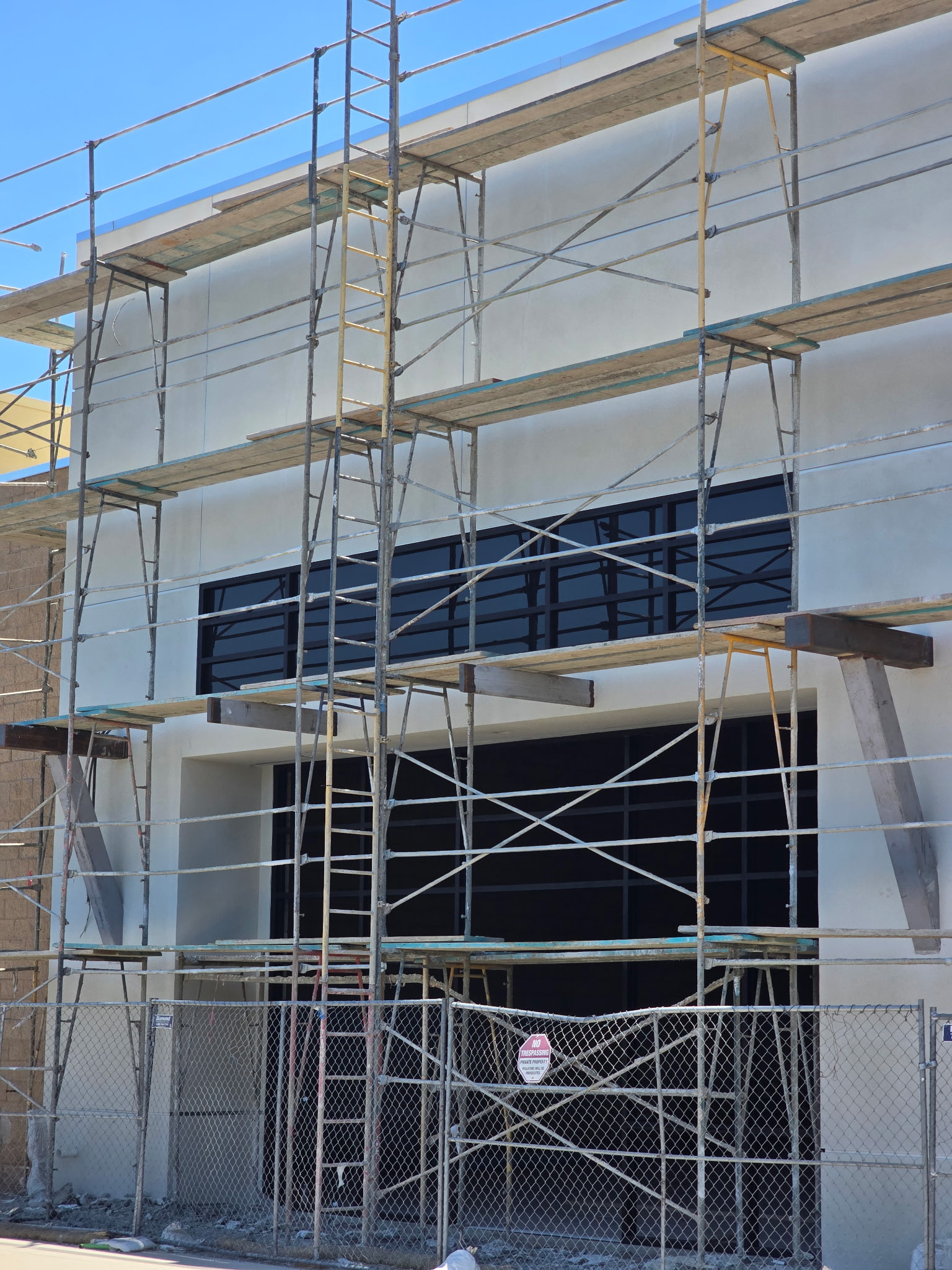 Multi-story commercial glazing before