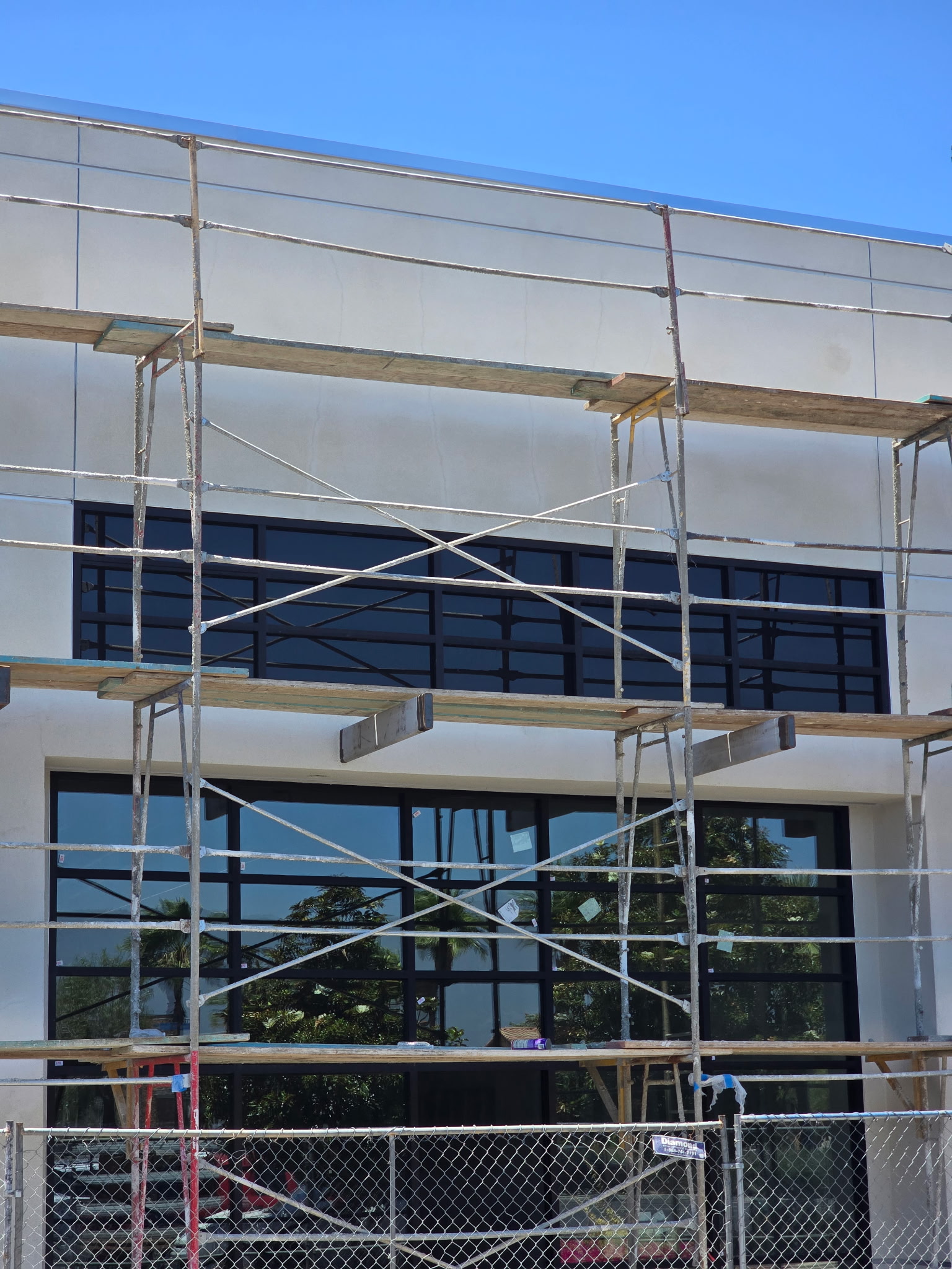 Commercial building glass installation before